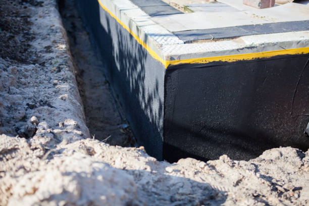 Professional Interior Drainage System technician working in Chalfont, PA